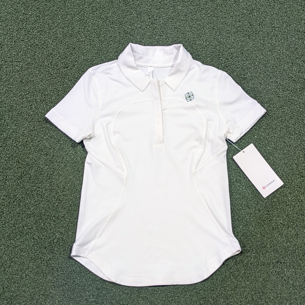 LULULEMON WOMENS QUICK-DRYING SHORT SLEEVE POLO-WHITE W/ DOGWOOD EMBROIDERY